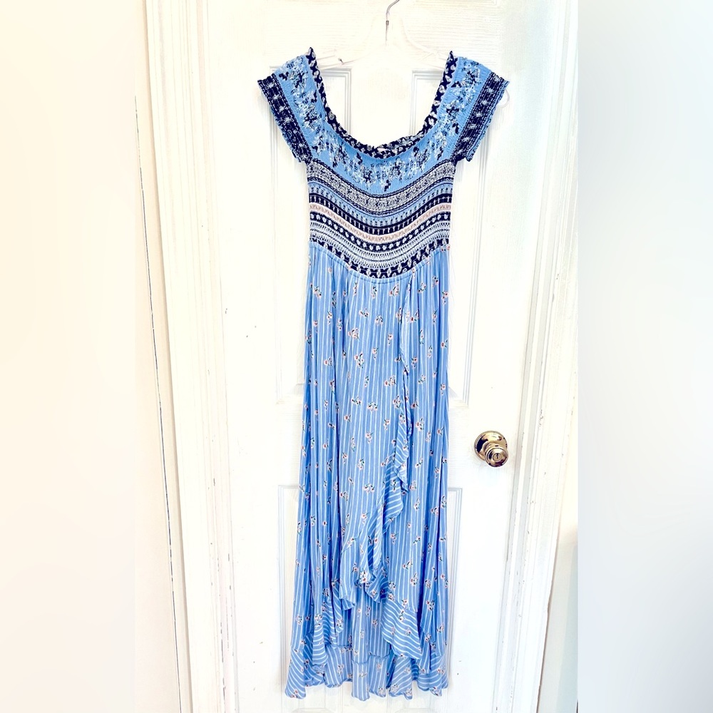 Candie’s blue floral dress with built-in shorts. Size medium